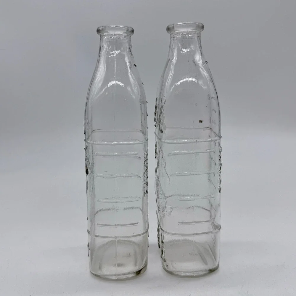 Vintage Embossed Glass‎ Milk Bottle Dog and Rabbit Scene Set of 2